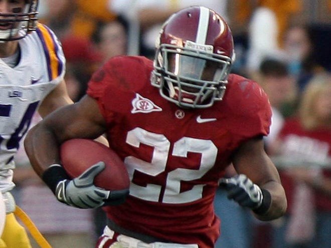 Alabama running back Mark Ingram (22) runs the ball in the third quarter against LSU at Bryant-Denny Stadium on Saturday. Ingram rushed for 144 yards on 22 carries.