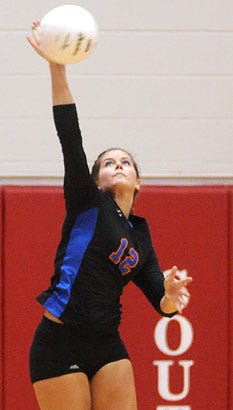 Eastland's Hope Linker serves during the team's Super-sectional match against Newark Saturday at South Beloit High School.