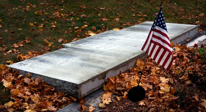 The Kingston war memorial knocked over by vandals on the night before Veterans Day.