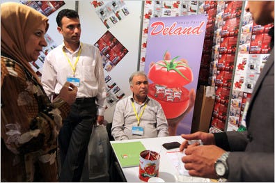 At a recent trade fair in Baghdad, companies from several nations were on hand to promote goods and services, but companies from the United States were notably absent. Above, a corporate booth at the fair’s Iranian pavilion.