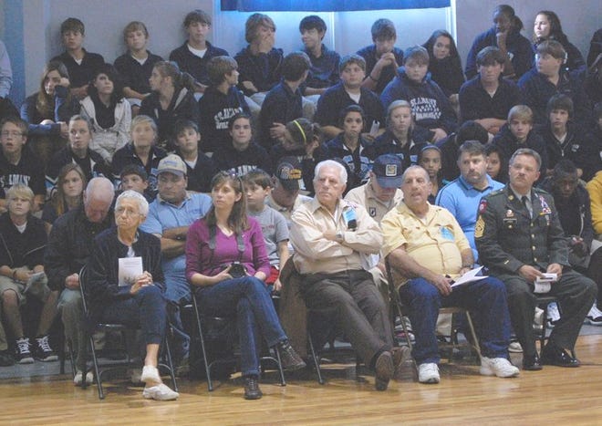 Veterans and their families gathered along with St. Amant Middle School students and staff Tuesday afternoon to honor veterans.