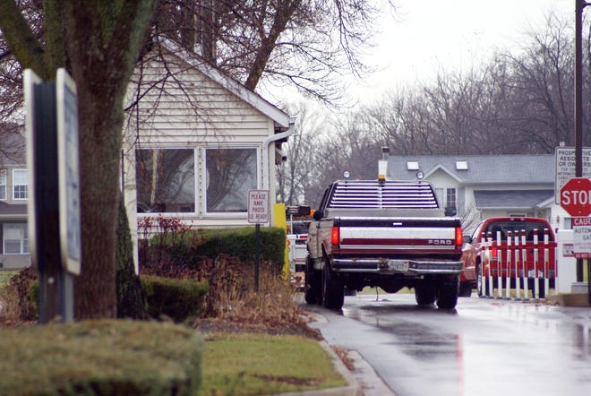A car waits to be screened into Candlewick Lake on Wednesday, Nov. 18, 2009, at the gated community’s main entrance off Illinois 76 north of Belvidere. Some residents are considering incorporating the community as an official municipality.