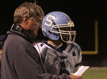 Photo by Anna Murphey/New Jersey Herald
Sparta head football coach, Pat Shea gives a play to quarterback Doug D'Angelo during the second quarter of the North 1, Group 3 semifinal game Friday night against Wayne Hills. The game went into over time and Wayne Hills won 41-38
Published: No Published Caption