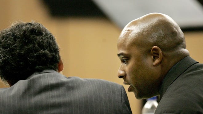 Former West Palm Beach police officer William McCray appears in court Monday after waiting 10 years for his case to come to trial, accusing the city of discriminating against him.