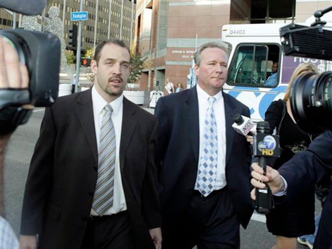 Michael Barrett, right, accused of secretly making nude videos of ESPN reporter Erin Andrews, and attorney David Willingham leave after Barrett's appearance in federal court in Los Angeles Friday, Nov. 20, 2009.