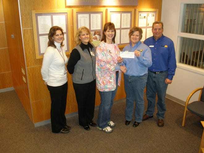 Wheeler Motors of Cheboygan recently presented a check for $2,001.76 to the Diagnostic Imaging Department at Cheboygan Memorial Hospital for use in promoting Breast Cancer Awareness. The money was raised during Wheeler’s 4th Annual Cookout and Raffle in October. Pictured, from left to right are Kristy Smolinski, Director of Diagnostic Imaging; Shari Schult, Chief Nursing Officer; Linda Ciarkowski, Radiology Technologist; Ami Nowosad, Wheeler Motors’ Business Manager; Spence Libby, Owner of Wheeler Motors.