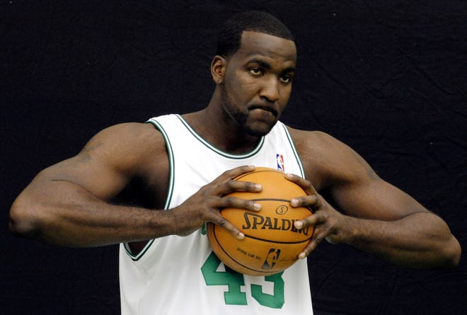 Kendrick Perkins pauses during a photo shoot at the team's edia day on Monday.