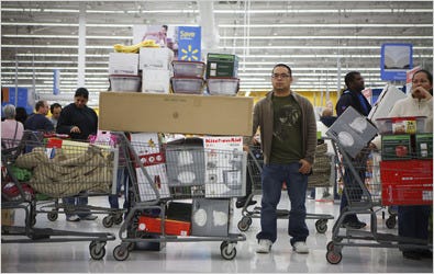 RJ Cortes lost no time filling up his cart at a Wal-Mart store in Sugar Land, Tex.