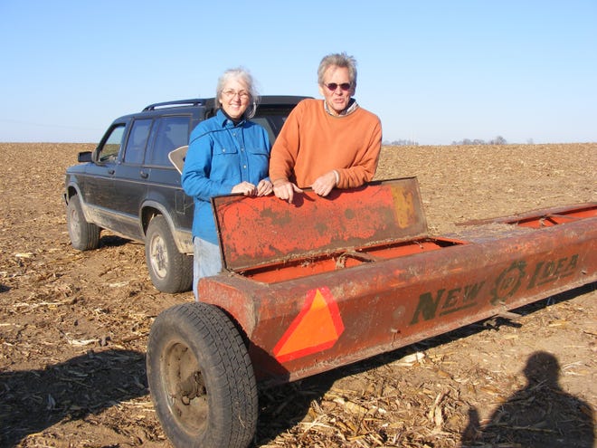 Bernie and Cindy Buchholz with their $50 antique New Idea planter.