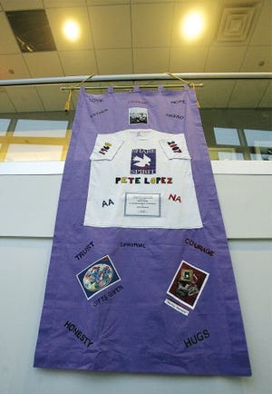 Photo by Daniel Freel/New Jersey Herald  A memorial AIDS quilt panel made in memory of the late Pete Lopez, Sussex County resident, hangs in Sussex County Community College’s Performing Arts Center. The quilt display, which will be on exhibit through Dec. 11, is in honor of World AIDS Day, which is Tuesday.