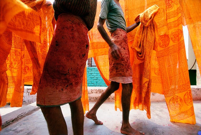 The photograph “Pilgrims Cloth,” shot in 1997 in Mathura, India, is part of the Cary Wolinsky exhibit “Fiber of Life” at the South Shore Art Center in Cohasset.