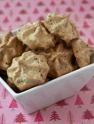 If you are looking for lighter fare in your holiday cookies try these milk chocolate meringues.