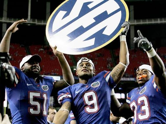 The Gators celebrate following the Gators' 31-20 victory over Alabama in the SEC Championship at the Georgia Dome Saturday, December 6, 2008.