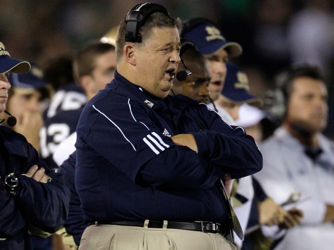 In this, Nov. 7, 2009, photo, Notre Dame coach Charlie Weis looks on during the fourth quarter of an NCAA college football game against Navy in South Bend, Ind. Notre Dame will try to bounce back from a loss to Navy seeking what would be the biggest victory of the Charlie Weis era when the Fighting Irish play at eighth-ranked Pittsburgh.