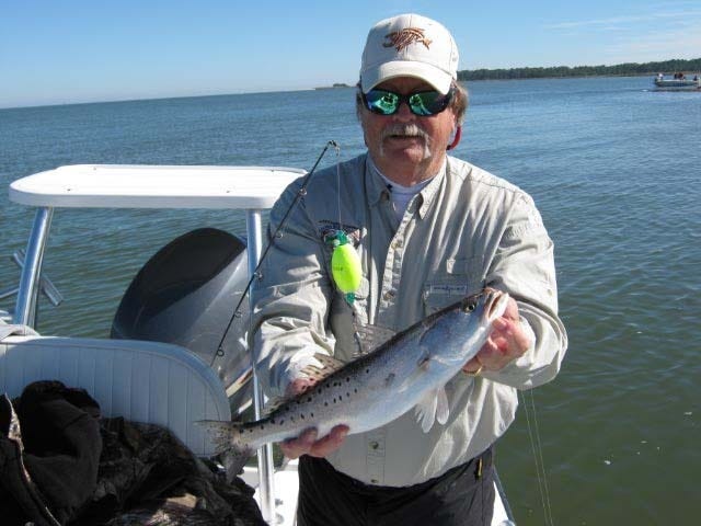 Wayne Rowell of Blackshear holds a large spotted sea trout he landed while fishing with Capt. Jim Edenfield of Bendarod Fishing Charters. The action took place in the Wassaw Sound area Saturday. (Special to the Savannah Morning News).