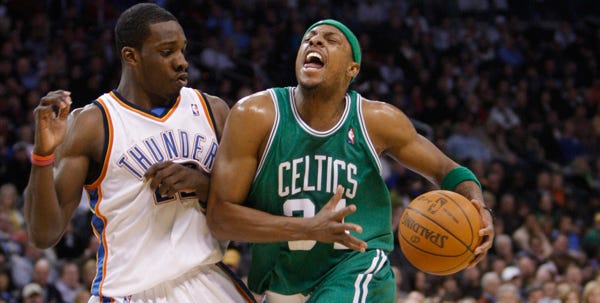 Boston's Paul Pierce drives around Oklahoma City forward Jeff Green during the second quarter of Friday night's game. Pierce scored 21 points in the first half and the Celtics completed a perfect four-game trip with a 105-87 victory over the Thunder.