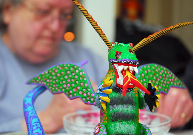 This dragon sculpture was one of many Mexican-themed pieces painted by students at Amazing Things Arts Center in Framingham on Sunday. The workshop was sponsored by Mango Tree Artisans of Sudbury.