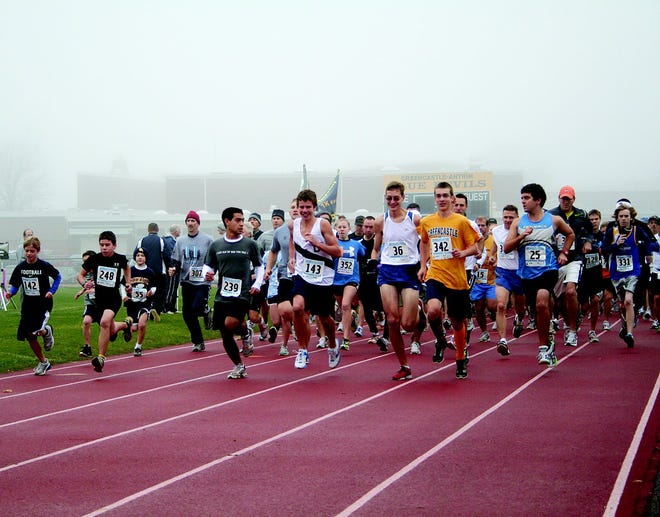 Fog greeted runners during the start of the annual Turkey Trot at the high school.