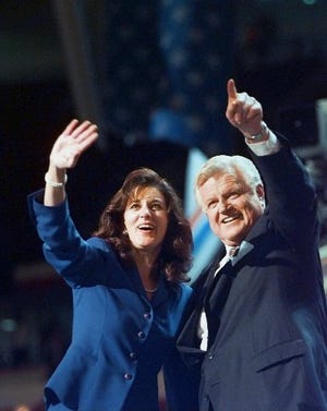 Sen. Edward Kennedy and his wife Victoria Reggie Kennedy wave to the crowd at the Democratic National Convention, Thursday, Aug. 29 1996. Mrs. Kennedy is selling the Washington, D.C., home she shared with her late husband, who died in August of a malignant brain tumor. The sale has no impact of the Kennedy family compound in Hyannisport, which Mrs. Kennedy continues to visit.