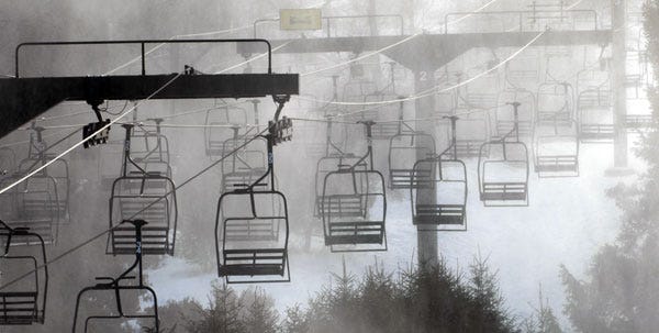 Ski lifts move up and down the mountain at Big Boulder Ski Area Thursday afternoon in Lake Harmony.