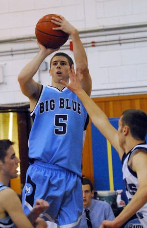 Medfield's Tylet Frasca lets go of a 3-pointer during Friday night's game against Dover-Sherborn.