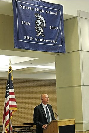 Photo by Anna Murphey/New Jersey Herald Sparta High School Principal Dennis Tobin welcomes a gathering at the 50th anniversary of Sparta High School.