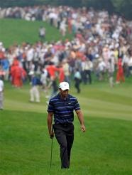 n this Nov. 7, 2009, file photo, Tiger Woods walks on the 15th hole fairway as a large gallery follows in the background during the third round of the HSBC Champions golf tournament in Shanghai, China. Hoping to save his marriage, Tiger Woods temporarily walks away from the game that made him a billionaire. His decision comes as one major sponsor says it will distance itself from Woods in its marketing campaigns. (An this Nov. 7, 2009, file photo, Tiger Woods walks on the 15th hole fairway as a large gallery follows in the background during the third round of the HSBC Champions golf tournament in Shanghai, China. Hoping to save his marriage, Tiger Woods temporarily walks away from the game that made him a billionaire. His decision comes as one major sponsor says it will distance itself from Woods in its marketing campaigns.