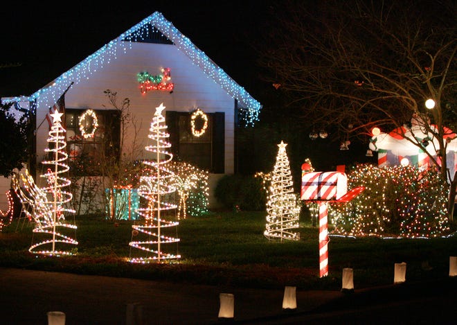 A home in the Countryside subdivision off Northwest 39th Avenue and 108th Boulevard is lit up with Christmas lights.