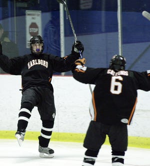 Marlborough's Steve Koester (left) celebrates after scoring a goal during the Panthers' 6-1 win over Algonquin in the opening round of the Boroughs Cup.