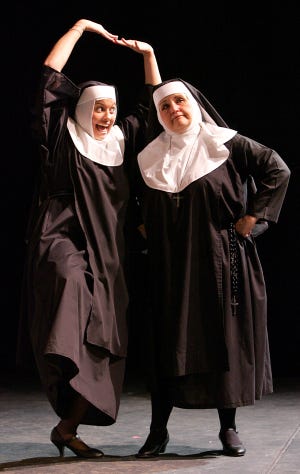 Characters Sister Robert Anne (left), Lola Hassan-Adams, and Reverend Mother, Sue Addis, pose in a scene from the Gainesville Community Playhouse upcoming play Nuncrackers.