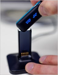 The Fitbit monitor.