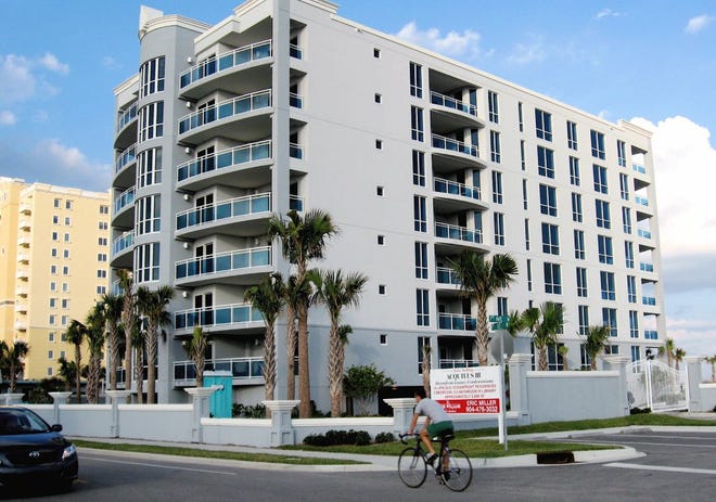 CAREN BURMEISTER/StaffThe Acquilus III condo at 807 First St. N. in Jacksonville Beach went into foreclosure before the units were sold. It was built at the former site of the First Street Grille.