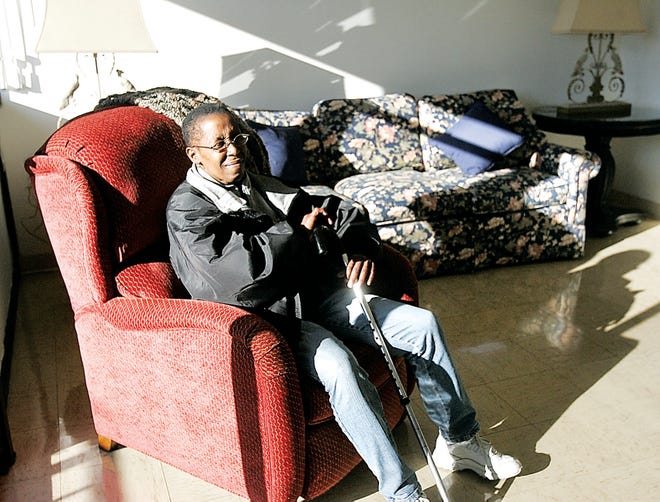 Photo by Amy Paterson/New Jersey Herald Debbie White, of Newton, sits in her new recliner that she obtained courtesy of a state program.