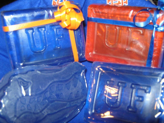 Two University of Florida students uses glycerin, a byproduct of biodiesel production, to produce these orange and blue Gator soaps.