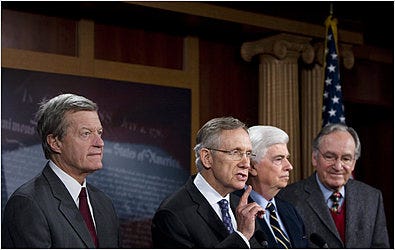 Senators Max Baucus, left, Harry Reid and Christopher J. Dodd at a news conference on Saturday. Mr. Reid, the majority leader, needed all 60 members of his caucus to back the health bill.