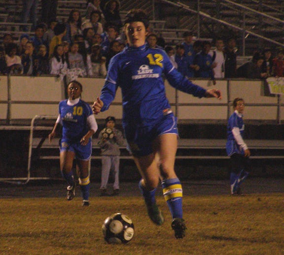East Ascension’s Caitlin Roddy gains possession during the first half of the Lady Spartans’ victory over St. Amant Friday night at the Pit.