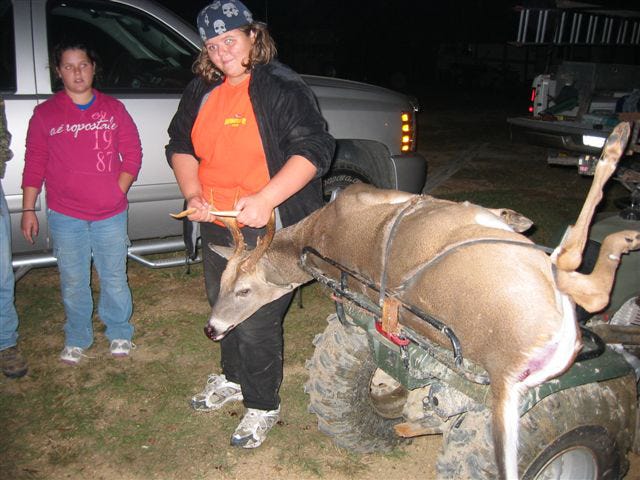 Montana Dupuy, 14, of Galvez, displays her first ever deer taken on youth hunt in Woodville, Miss. Nov 14 with her dad. The buck shot with a .243 calibar had nine points and weighed 212 pounds.