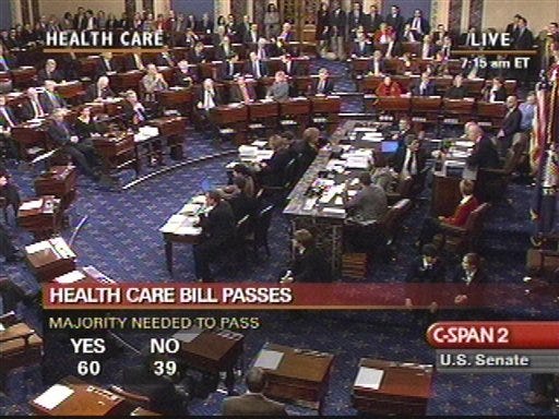 In this image made from video the U.S. Senate passes the health care overhaul bill Thursday Dec. 24, 2009.