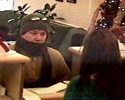 A bank robbery suspect demands cash Saturday from a teller at Eastern Federal Bank in Plainfield.