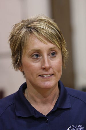 In her third season as head coach, Monmouth-Roseville's Robin Bell guided the Titans to their first-ever regional title and a berth in the Class 2A Sweet 16. The team has a record of 59-50 in that span, including a mark of 22-15 during the 2009 season.