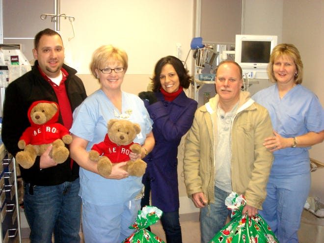 Aèropostale managers recently delivered Teddy bears to Morton Hospital’s Day Surgery Unit. Pictured, from left, are John Nunes, manager of Aèropostale at Cape Cod Mall; Kyle Sepersky, RN; Erika Amaral, Aèropostale district manager; Jim Payette, manager of Aèropostale at Silver City Galleria Mall; and Shelly Moquin, RN.
