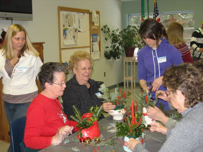 South Berwick florist Abby Chic oversees Marshwood High School student, Leah Guercio assisting South Berwick seniors in making holiday arrangements. Participating seniors are (left to right) DeeDee Dionne, Faye Friend and Florence Chagnon.

 

Courtesy photo