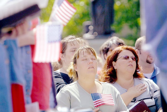 Shelley Husemann of Auburn joined hundreds of people on the steps of the Illinois Capitol building on Sept. 15, 2001, to observe a National Day of Prayer to mourn the victims and offer support for the survivors of the terrorist acts in the United States.