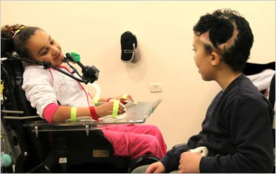 Marya, a Palestinian, and Orel, an Israeli, are 8-year-old neighbors at Jerusalem's Alyn Hospital.
