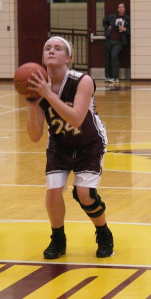 Line it up: Sophomore Emma Hoerr concentrates on making a free throw for the Ghosts.