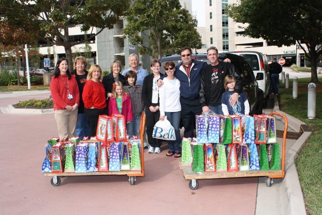 Provided by Carldon LaheyCarldon Lahey and other volunteers delivered hundreds of Christmas presents in December to pediatric patients who were in the hospital during the holidays.