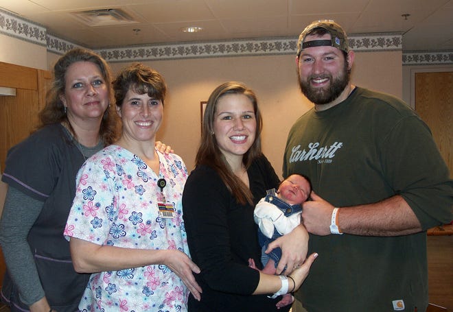 From left: Laura Bernstein, RN; Mary Jeanne Joyal, RN; Katherine Young; baby Daniel; and Kyle Young.