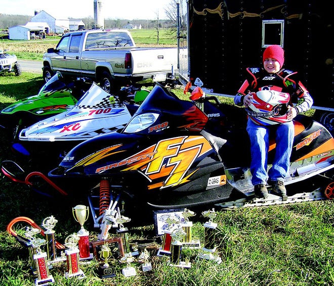 Antrim Township youth Conner Statler, 13, is a force to be reckoned with when he gets behind the handlebars of a snowmobile. He competes in drag racing and has a bundle of trophies marking his victories.
