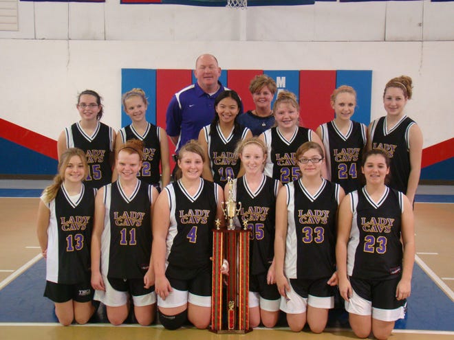 Pictured here is coach Edwin Graham and the members of the eighth grade Lady Cavaliers basketball team from Calvary Day School which recently went 4-0 and defeated rival Blessed Sacrament 18-9 in the finals of the 4th annual Kevin A. Brophy Memorial Middle School Basketball Tournament.Special to the Closeup