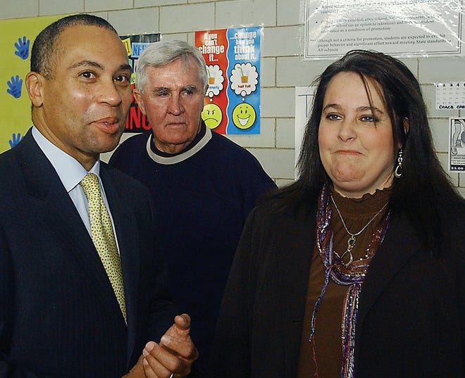 Gov. Deval Patrick, left, stands with School Committee member Peter Corr, center, and Mulcahey School principal Kristel Torres Wednesday morning. The governor toured the school as part of a push for his education reform bill which is under debate by the House.